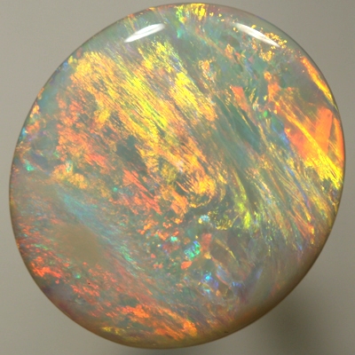 SOLID SEMI BLACK OPAL Bright orange and gold yellow in large rolling flashes. SEE VIDEO